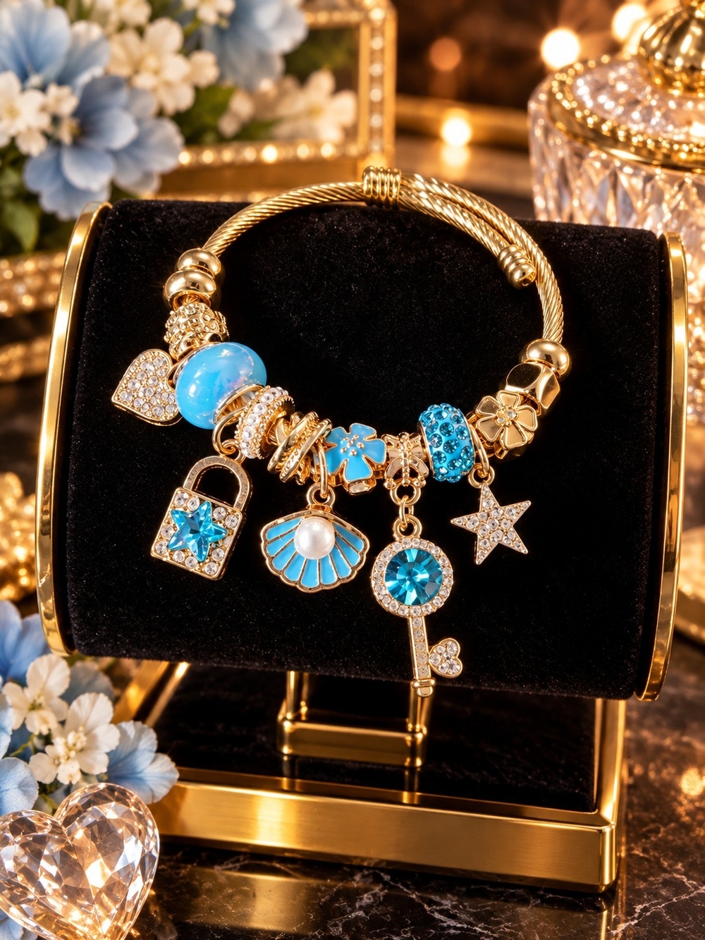 Gold Plated Charm Bracelet with Blue Crystal Charms